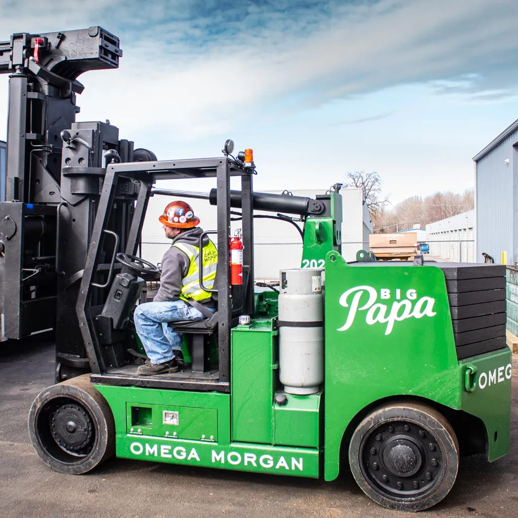 Omega Morgan crew relocating large industrial machinery