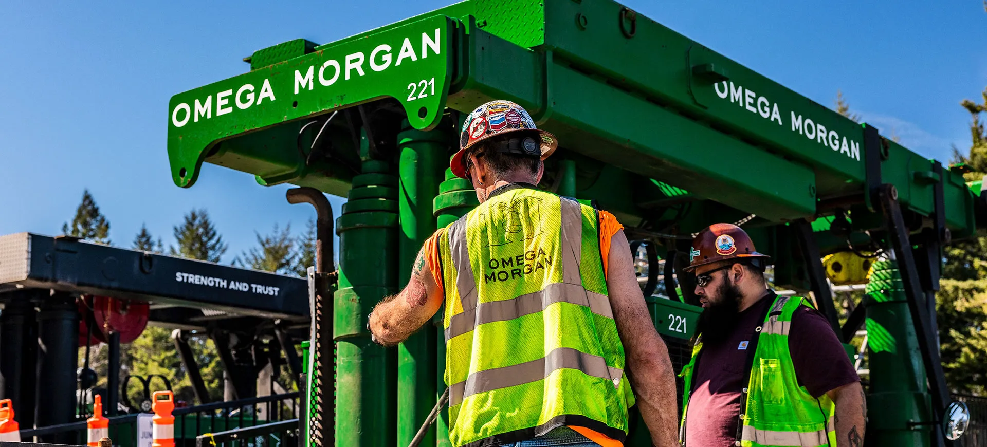 Omega Morgan technician performing precision alignment work