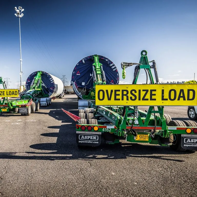 Omega Morgan oversized load on a specialized transport trailer